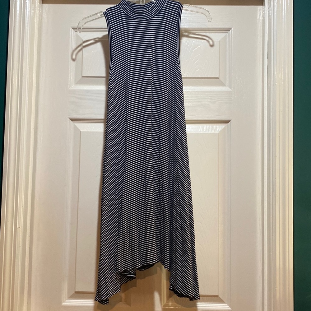 Black and White stripped, Asymmetrical dress size xs junior. Rayon and Spandex.